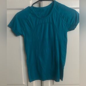Turquoise Lululemon short sleeve shirt
NWOT
in amazing condition, never worn